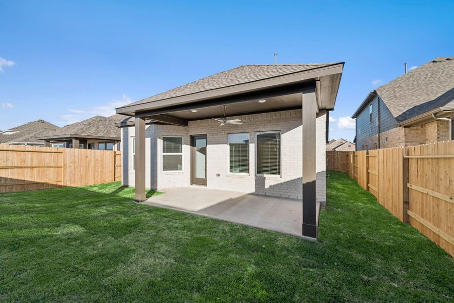 Exterior details and patio area of a home in Marvida, Cypress (Image 27).