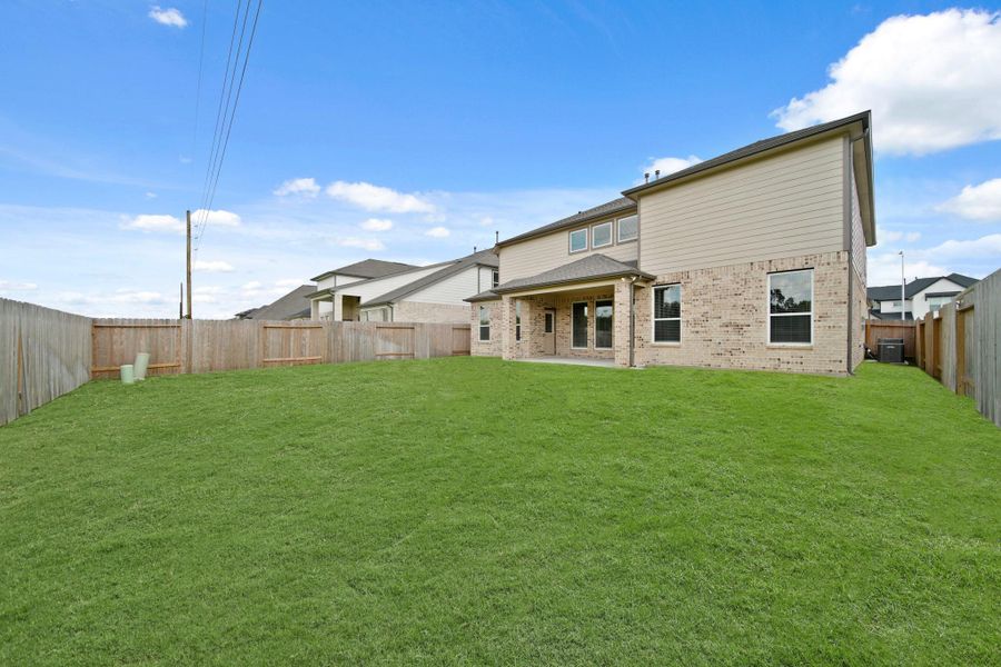 Front exterior of a new home in Morton Creek Ranch, Katy, TX, highlighting curb appeal (Image 13). Front exterior of a new home in Morton Creek Ranch, Katy, TX, highlighting curb appeal (Image 13).
