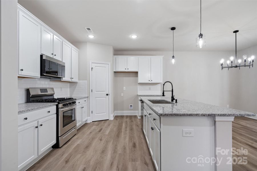 Furnished interior view inside a new home in , Charlotte (Image 7). Furnished interior view inside a new home in , Charlotte (Image 7).