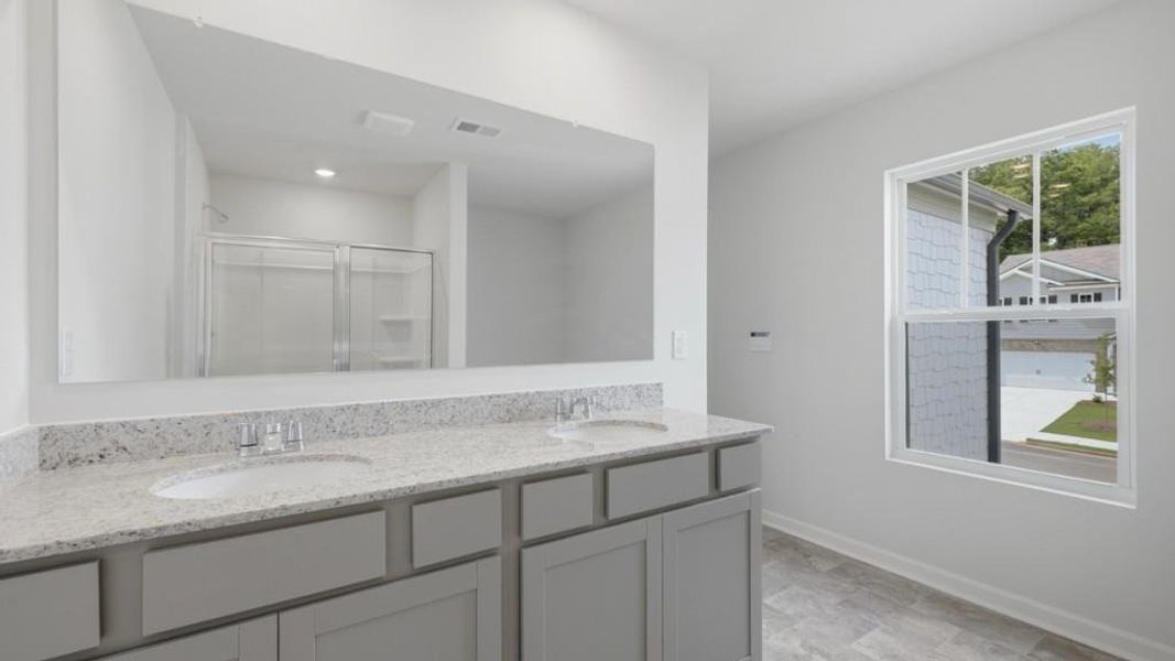 Furnished interior view inside a new home in Oaks at Cedar Grove, Fairburn (Image 11).
