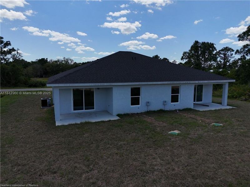 Front exterior of a new home in , Sebring, FL, highlighting curb appeal (Image 13).