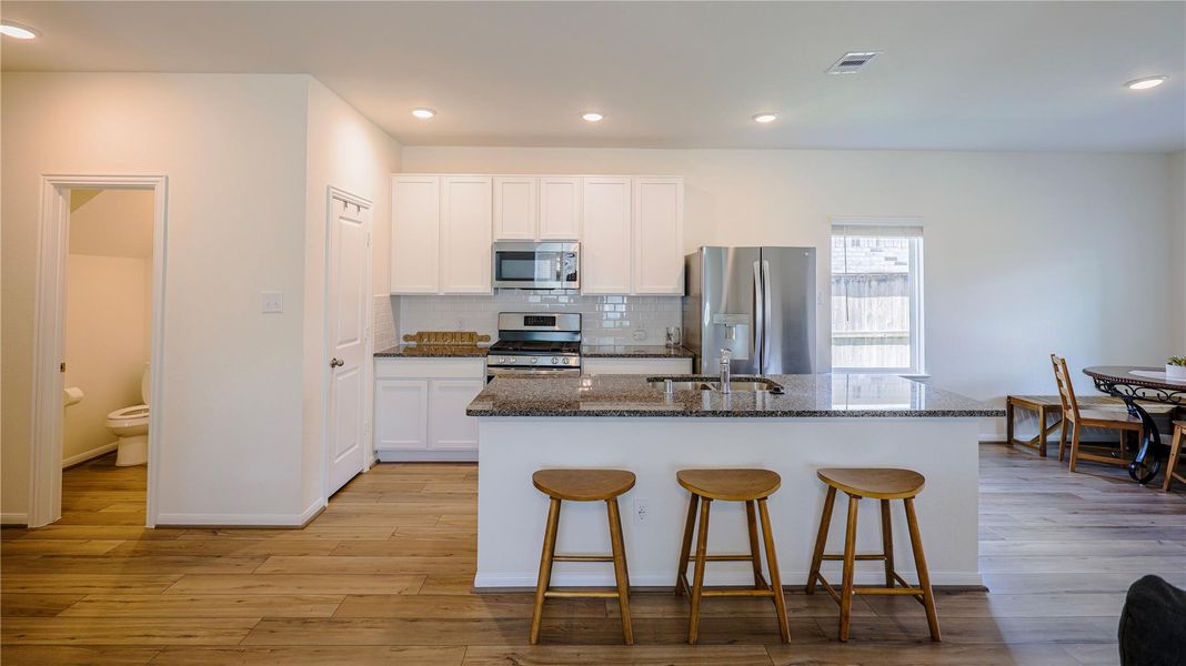 Furnished interior view inside a new home in Woodshore, Clute (Image 16).