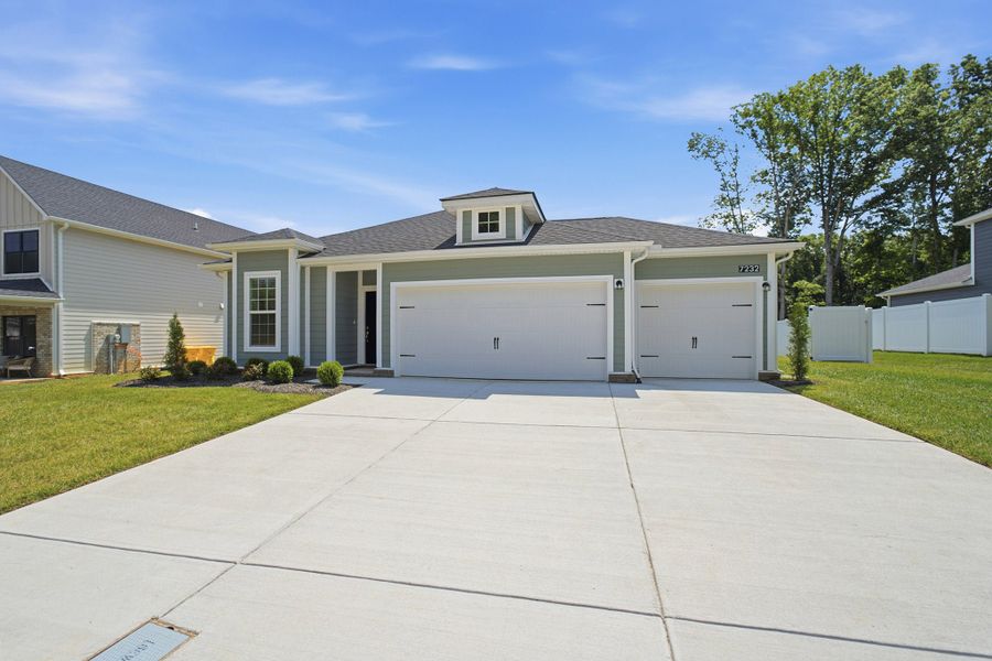 Front exterior of a new home in Brush Creek, Fairview, TN, highlighting curb appeal (Image 18). Front exterior of a new home in Brush Creek, Fairview, TN, highlighting curb appeal (Image 18).