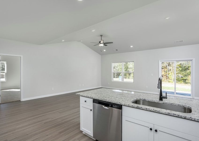 The kitchen has a spacious breakfast nook that overlooks the family room.