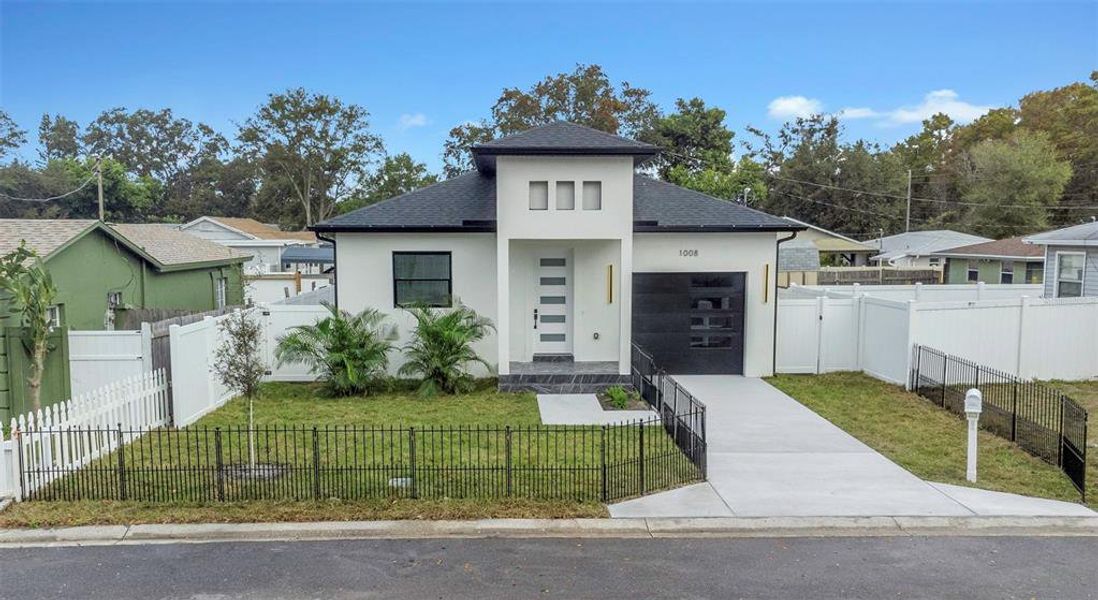 Front exterior of a new home in , Clearwater, FL, highlighting curb appeal (Image 23).