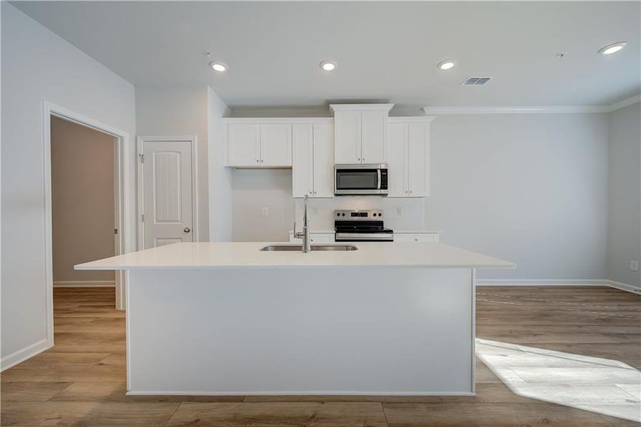 Furnished interior view inside a new home in Auburn Ridge, Riverdale (Image 7). Furnished interior view inside a new home in Auburn Ridge, Riverdale (Image 7).