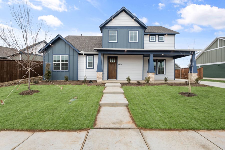 Front exterior of a new home in Heritage Towne, Midlothian, TX, highlighting curb appeal (Image 24). Front exterior of a new home in Heritage Towne, Midlothian, TX, highlighting curb appeal (Image 24).