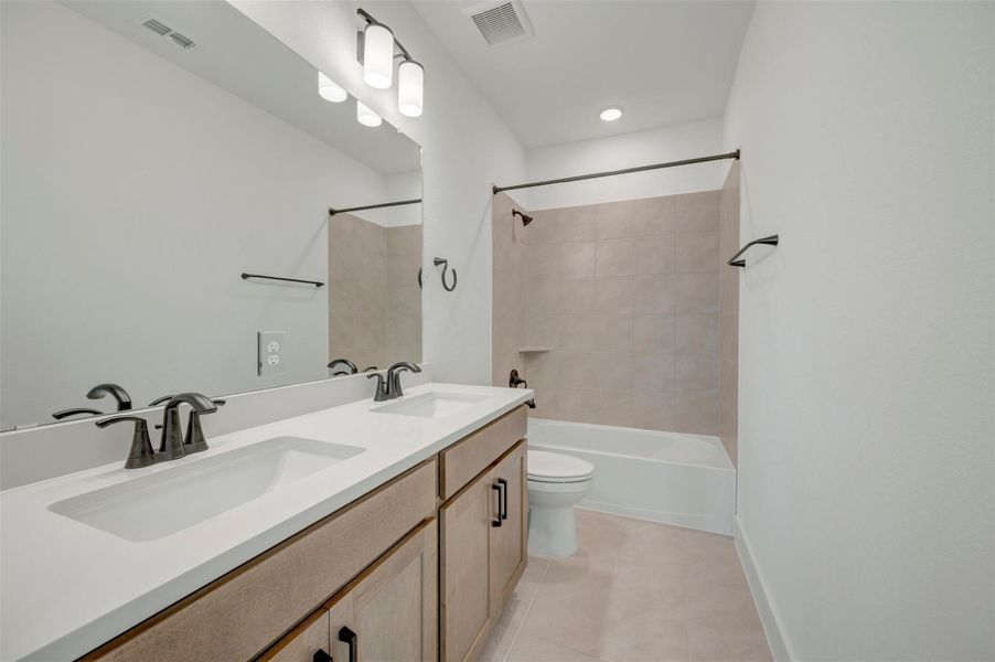 Furnished interior view inside a new home in Elyson - Grove Row Collection, Katy (Image 7).