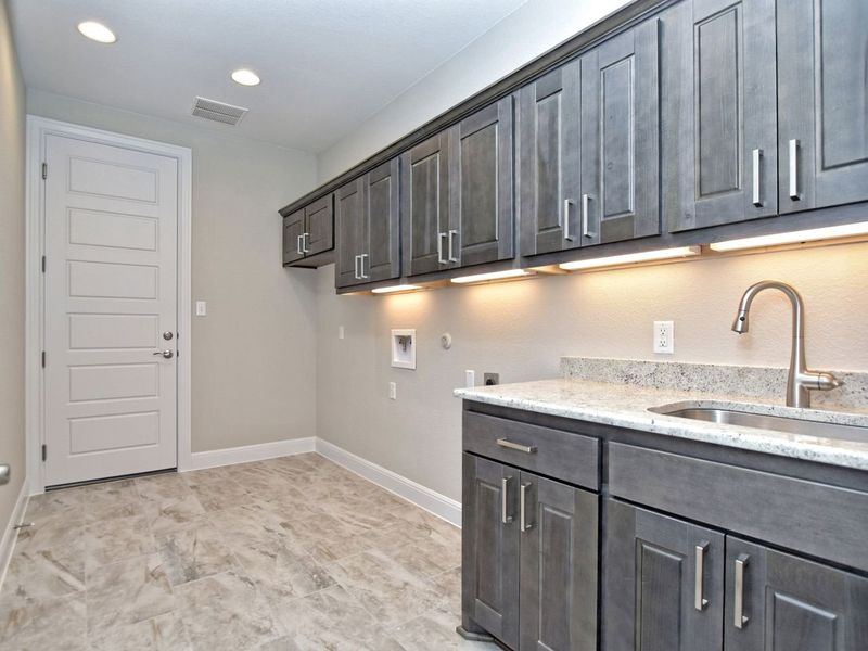 Representative furnished interior of a home built from the Madera II by Giddens Homes in Scofield Farms Estates, Georgetown (Image 172).