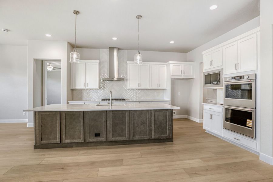 Furnished interior view inside a new home in RainDance, Windsor (Image 14).