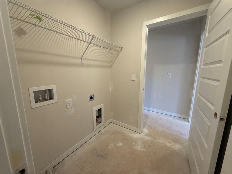 In-progress construction of a new home in The Towns at Auburn Station East, Auburn, GA (Image 30).