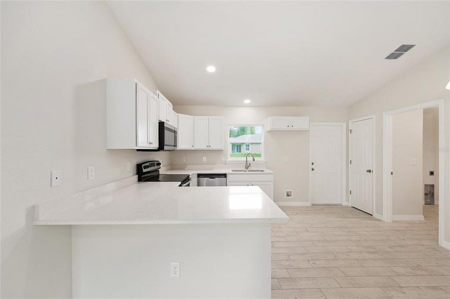 Furnished interior view inside a new home in , Ocala (Image 8).