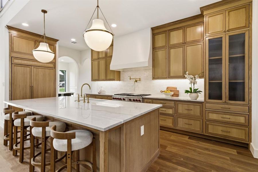 Built in refrigerator and island storage