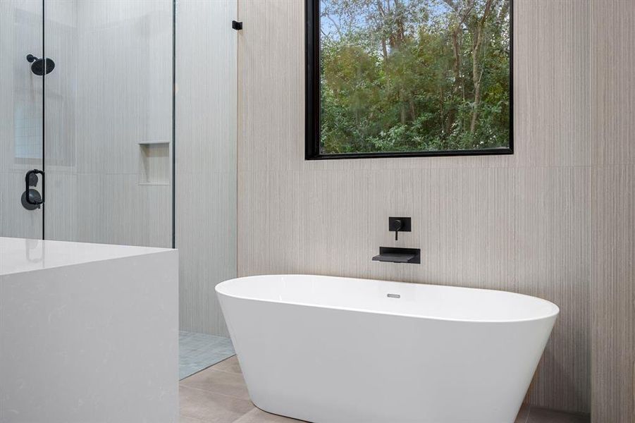 Transform your evenings with a candlelit soak in the free-standing tub