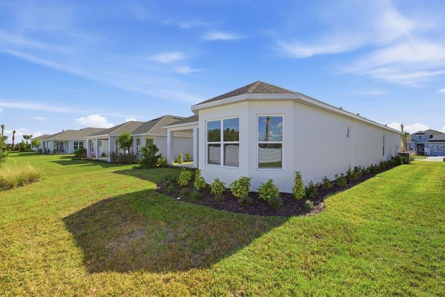 Exterior details and patio area of a home in Esplanade at Westview, Kissimmee (Image 3).