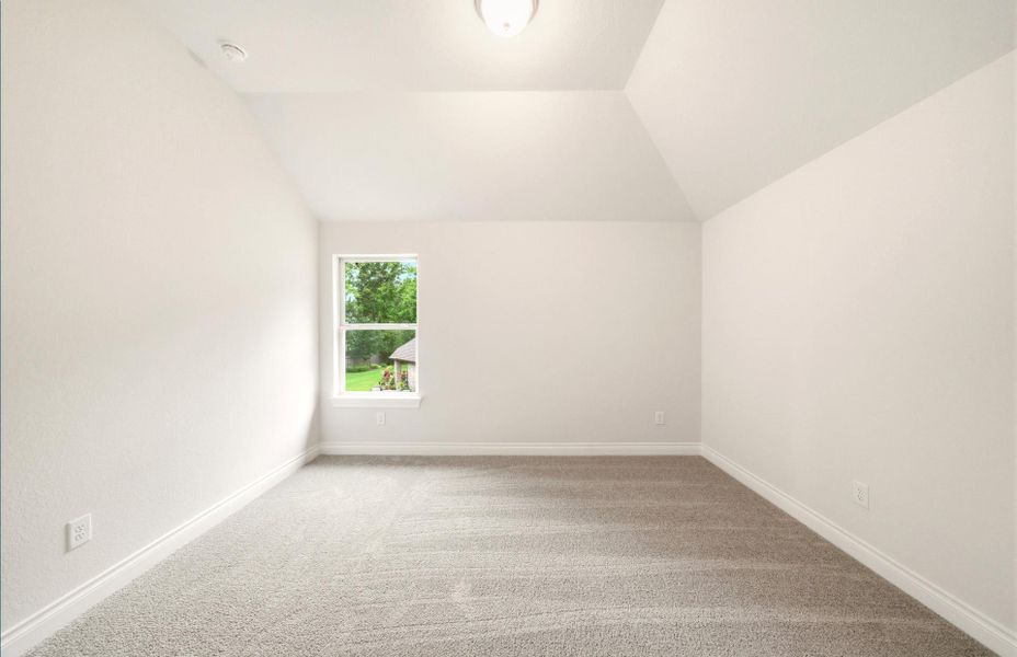 Spacious, unfurnished interior of a new home in The Woodlands Hills 65′, Willis (Image 42).