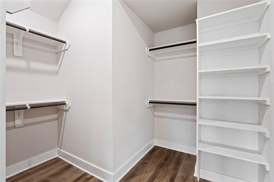 This walk-in closet offers generous storage with built-in shelving and plenty of hanging space to keep everything organized. It’s a dream setup for buyers who love having a dedicated space for easy, clutter-free living.