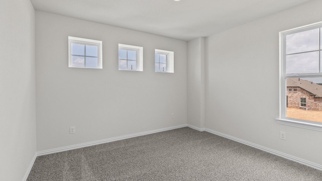 Representative furnished interior of a home built from the Southfork by Brightland Homes in Cielo, Conroe (Image 14).