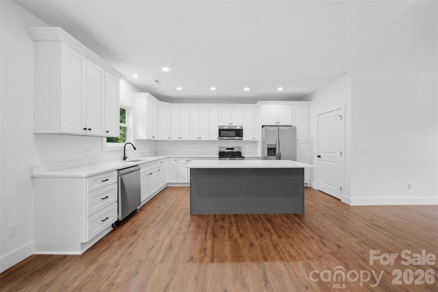 Furnished interior view inside a new home in , Lenoir (Image 12).