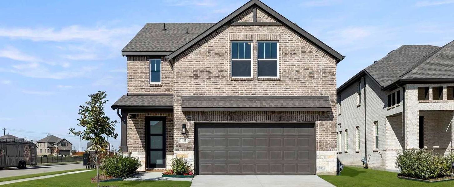 Representative exterior photo of a completed home built from the Cates by Ashton Woods in Century Farms, Celina, TX (Image 18).