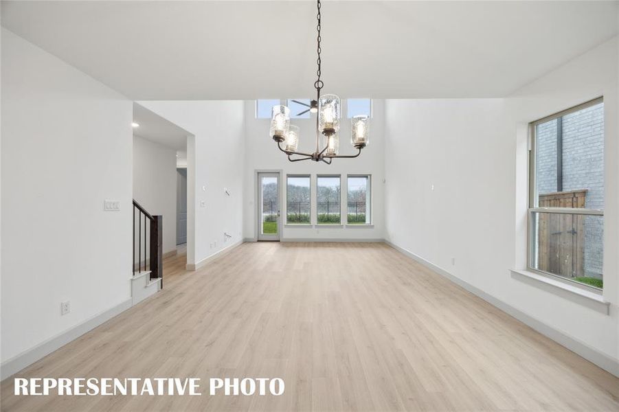 You'll enjoy a family room spacious enough to host the entire family in our Orleans plan!  REPRESENTATIVE PHOTO