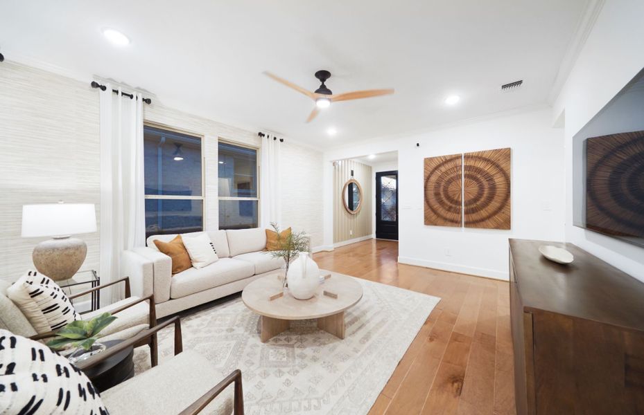 Representative furnished interior of a home built from the Flagstone by DiVosta in BeachWalk by Manasota Key, Englewood (Image 9).