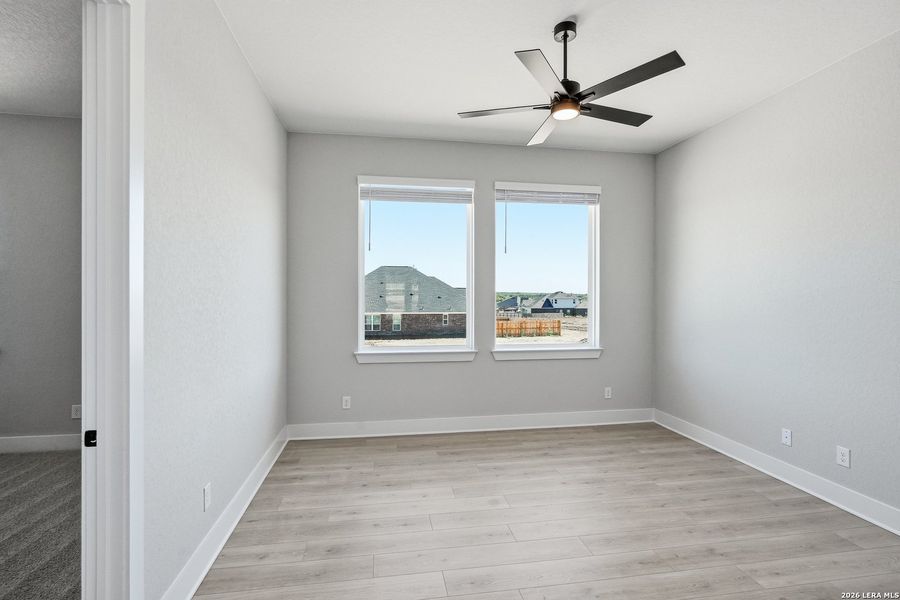 Spacious, unfurnished interior of a new home in Potranco Oaks, Castroville (Image 39).