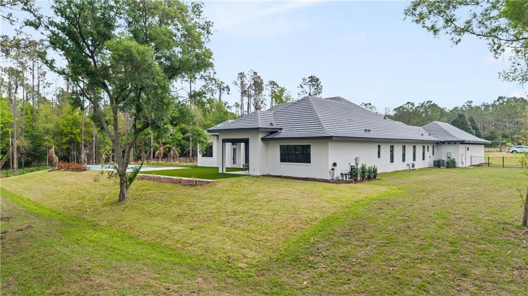 Exterior details and patio area of a home in Bella Collina, Montverde (Image 35). Exterior details and patio area of a home in Bella Collina, Montverde (Image 35).