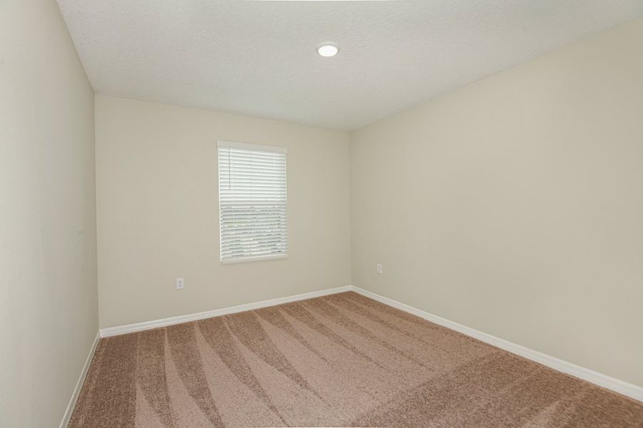 Spacious, unfurnished interior of a new home in Scenic Terrace, Haines City (Image 24).