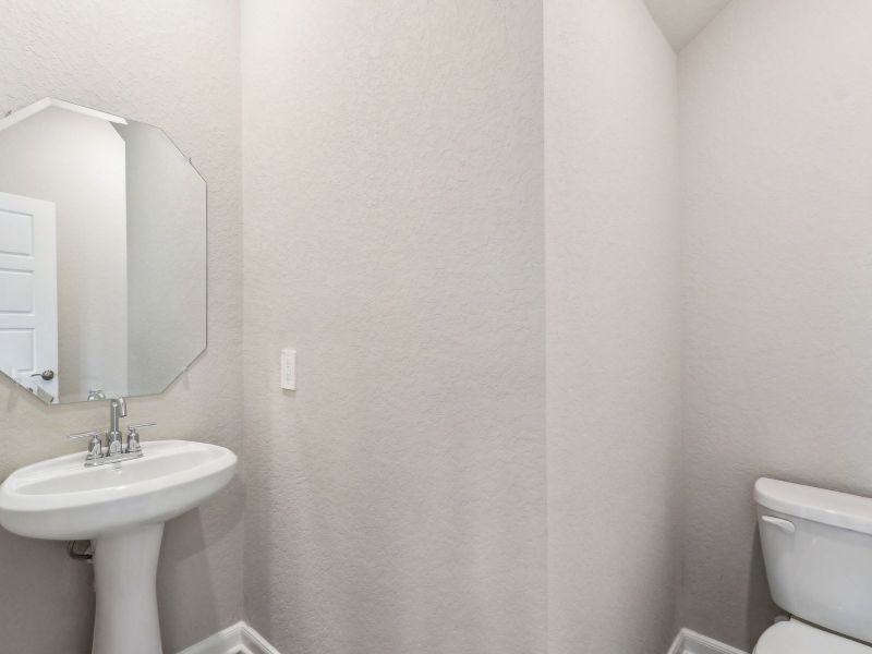 Powder room in the Medina floorplan at a Meritage Homes community. Powder room in the Medina floorplan at a Meritage Homes community.