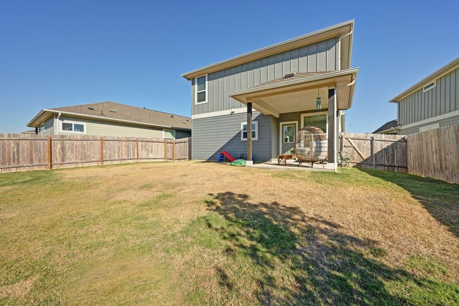 Exterior details and patio area of a home in Porter Country, Buda (Image 22).