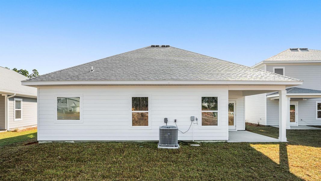 Exterior details and patio area of a home in Bayside at Ward Creek, Panama City Beach (Image 3).