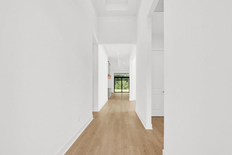 Spacious, unfurnished interior of a new home in Cove Royale, Stuart (Image 15).