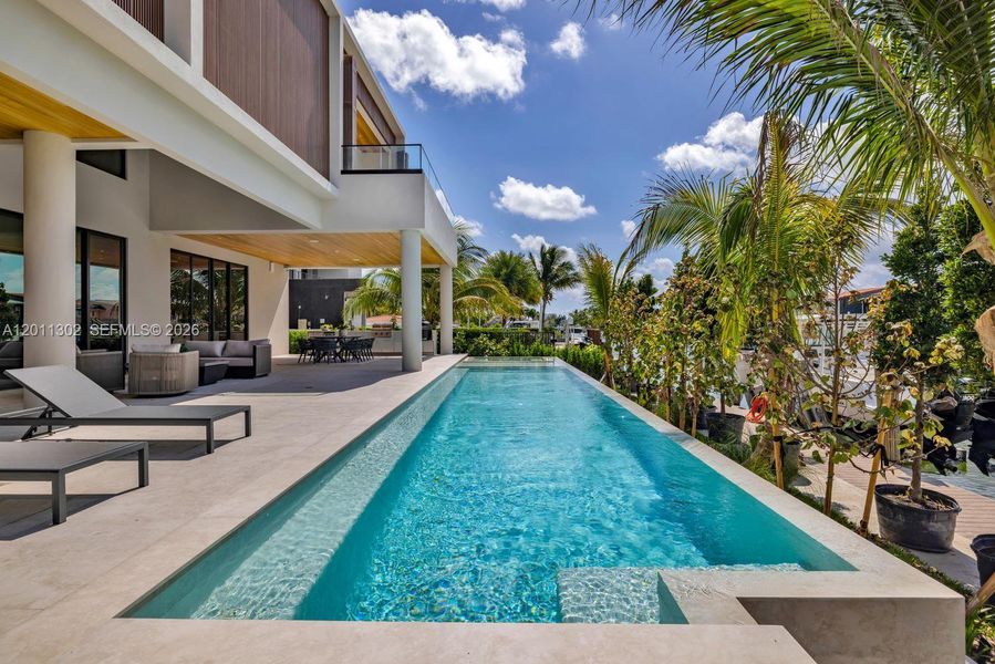 Exterior details and patio area of a home in , North Miami (Image 29).
