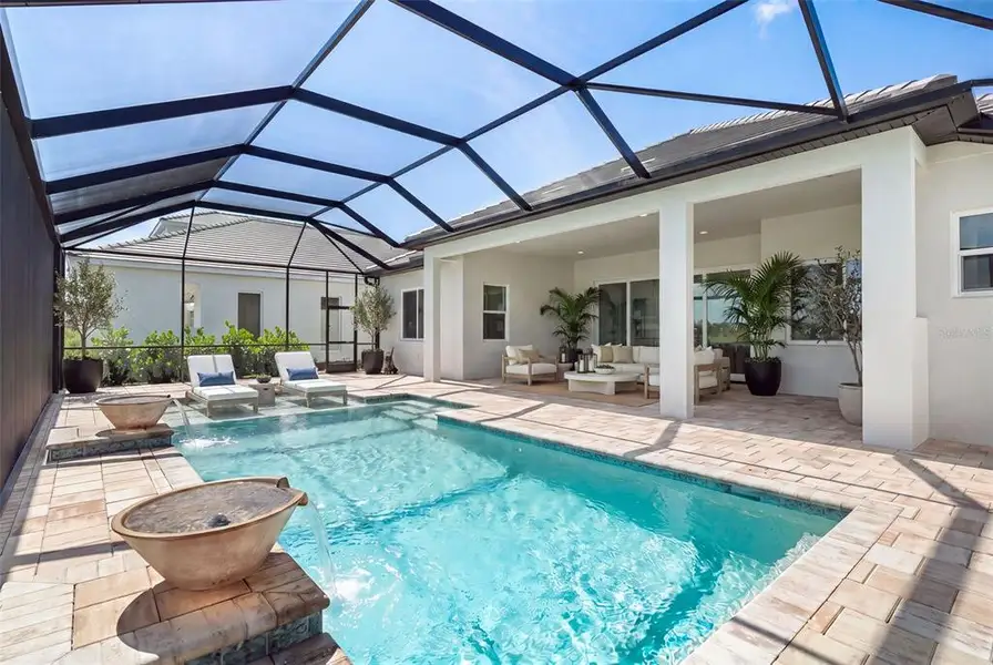 Exterior details and patio area of a home in , Sarasota (Image 4).