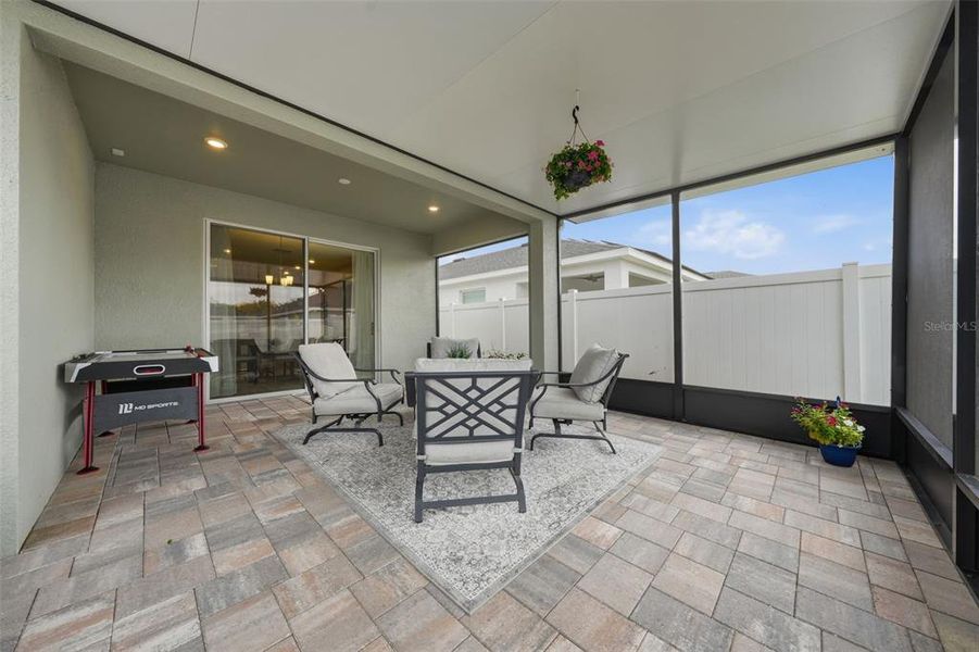 Exterior details and patio area of a home in Geneva Landings, Davenport (Image 27).