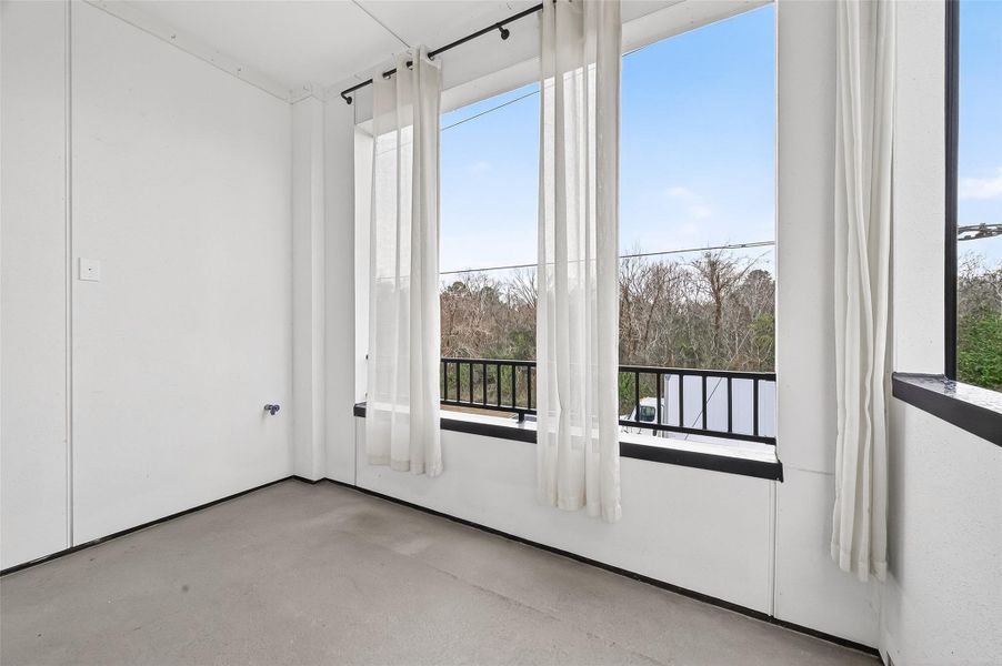 Spacious, unfurnished interior of a new home in The Corner At Buffalo Pointe, Houston (Image 30).