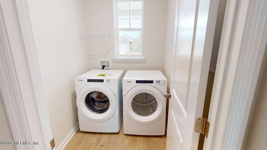 Furnished interior view inside a new home in RiverTown - Forest, St. Johns (Image 4).