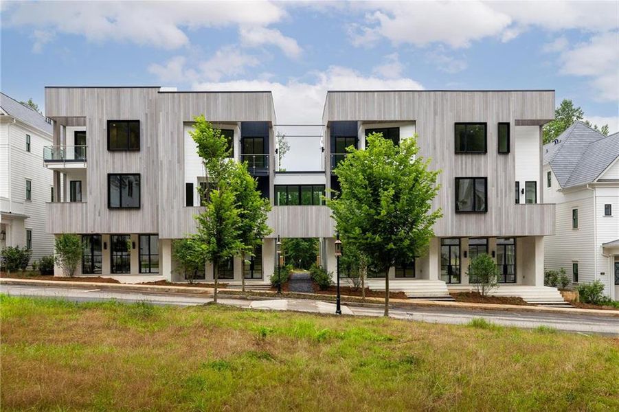 Front exterior of a new home in , Chattahoochee Hills, GA, highlighting curb appeal (Image 1).