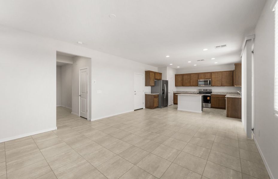Spacious, unfurnished interior of a new home in Asante- Atrium Series, Surprise (Image 25).