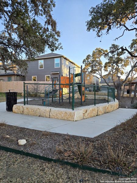 Front exterior of a new home in Cove at Westover Hills, San Antonio, TX, highlighting curb appeal (Image 13).
