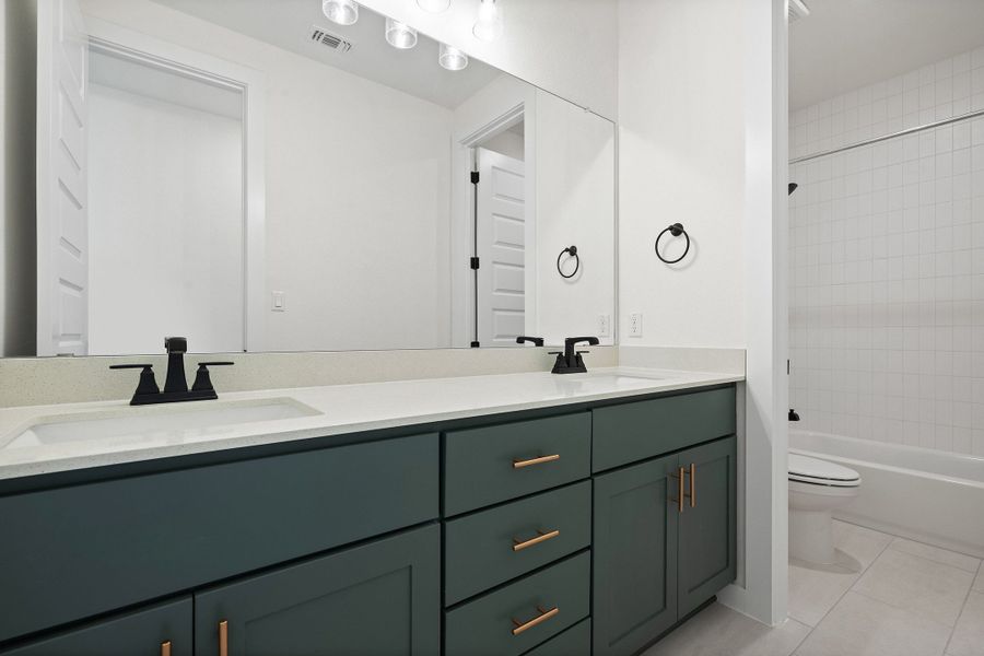Furnished interior view inside a new home in Heritage, Dripping Springs (Image 17).