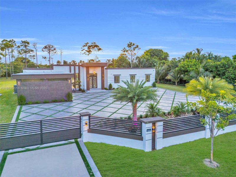 Front exterior of a new home in , Homestead, FL, highlighting curb appeal (Image 23).