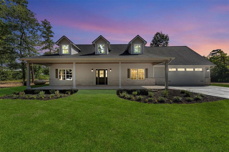 Front exterior of a new home in , New Waverly, TX, highlighting curb appeal (Image 22).