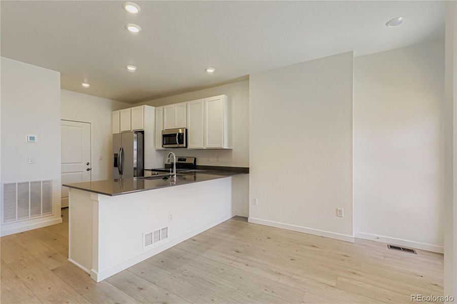 Furnished interior view inside a new home in Parterre: The Parkside Collection, Thornton (Image 4).