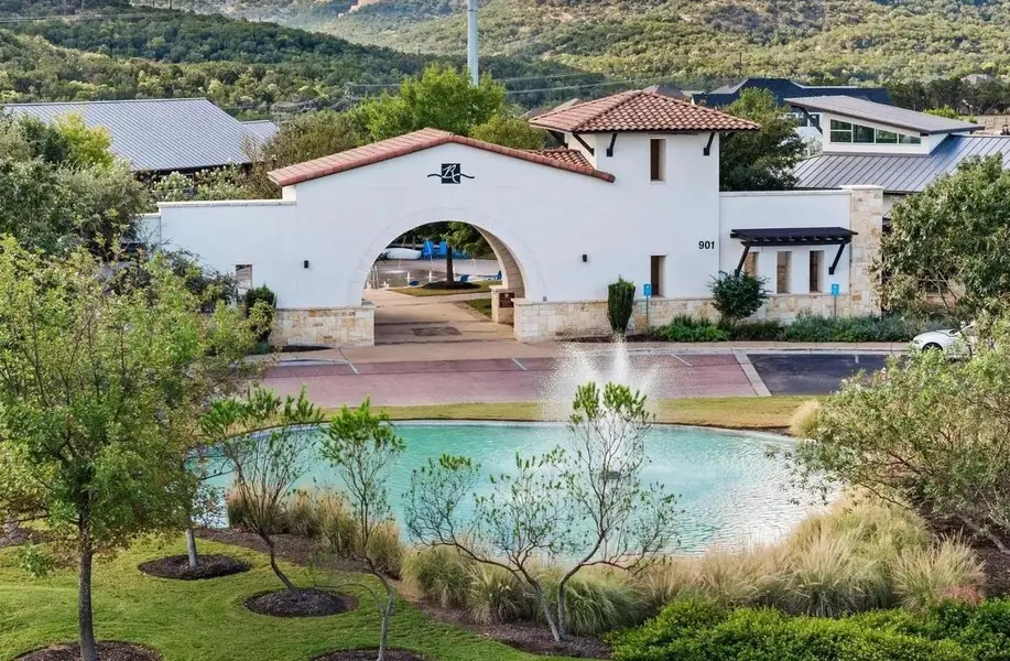 Front exterior of a new home in Rough Hollow The District, Lakeway, TX, highlighting curb appeal (Image 2). Front exterior of a new home in Rough Hollow The District, Lakeway, TX, highlighting curb appeal (Image 2).