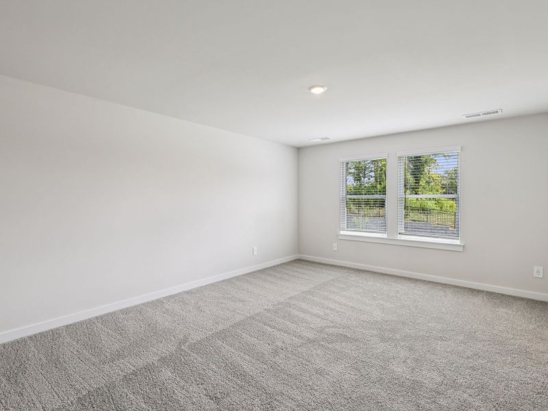 The primary suite offers a private retreat.