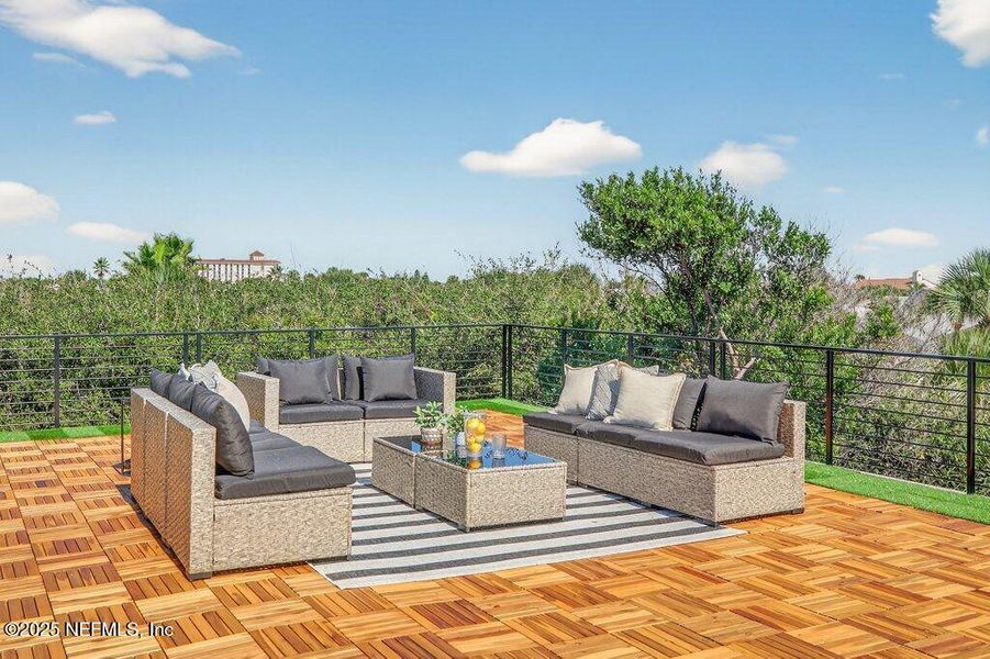 Exterior details and patio area of a home in , Neptune Beach (Image 38).