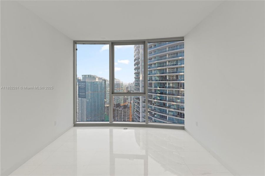 Spacious, unfurnished interior of a new home in Aston Martin Residences, Miami (Image 42).