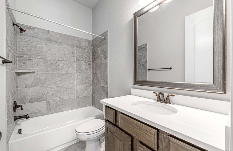 Representative furnished interior of a home built from the 3358 by Ravenna Homes in Artavia 70′, Conroe (Image 29).